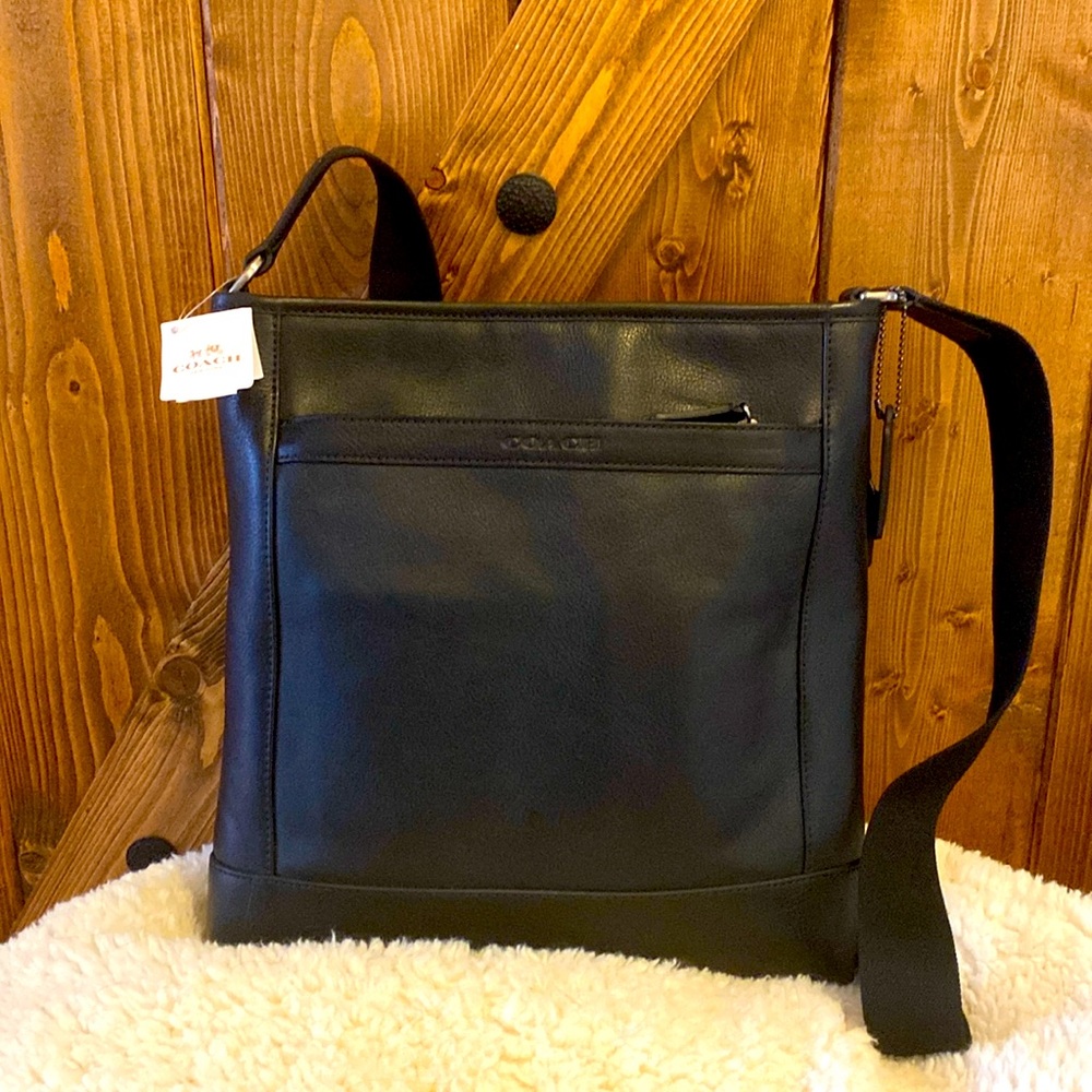 Brand new, never used black Coach purse